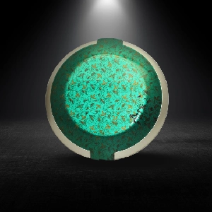 Premium turquoise textured pattern finish on automotive interior dial button using luxury spray coating