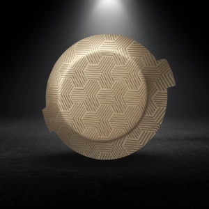 Laser marked geometric pattern on injection molded automotive circular component base by Spinks Softech