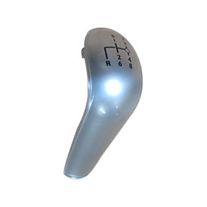 Metallic silver spray coating and pad printed gear shift diagram on automotive gear knob